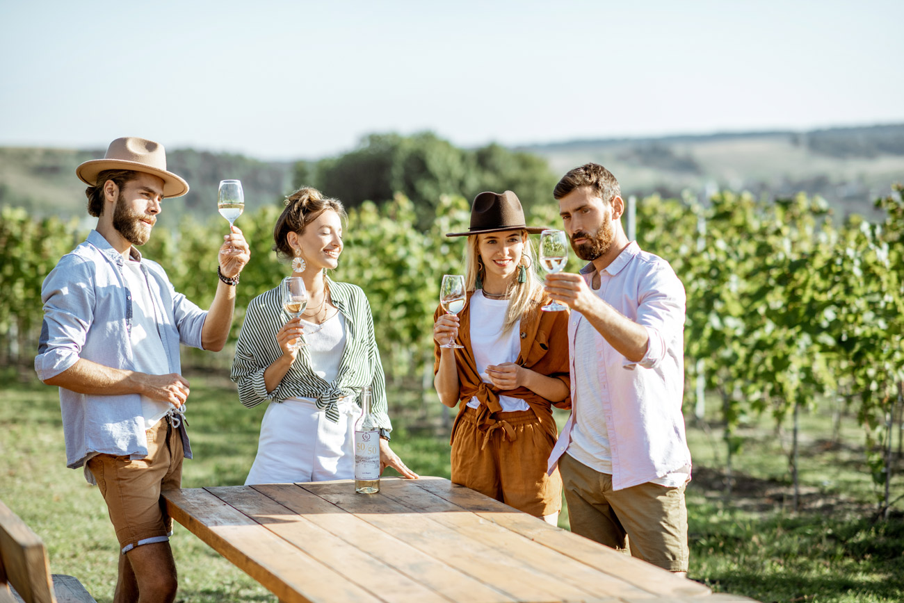 Friends at a winery operating legally with an alcohol bond
