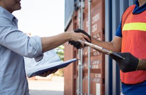 Freight broker shaking hands with a logistics guy
