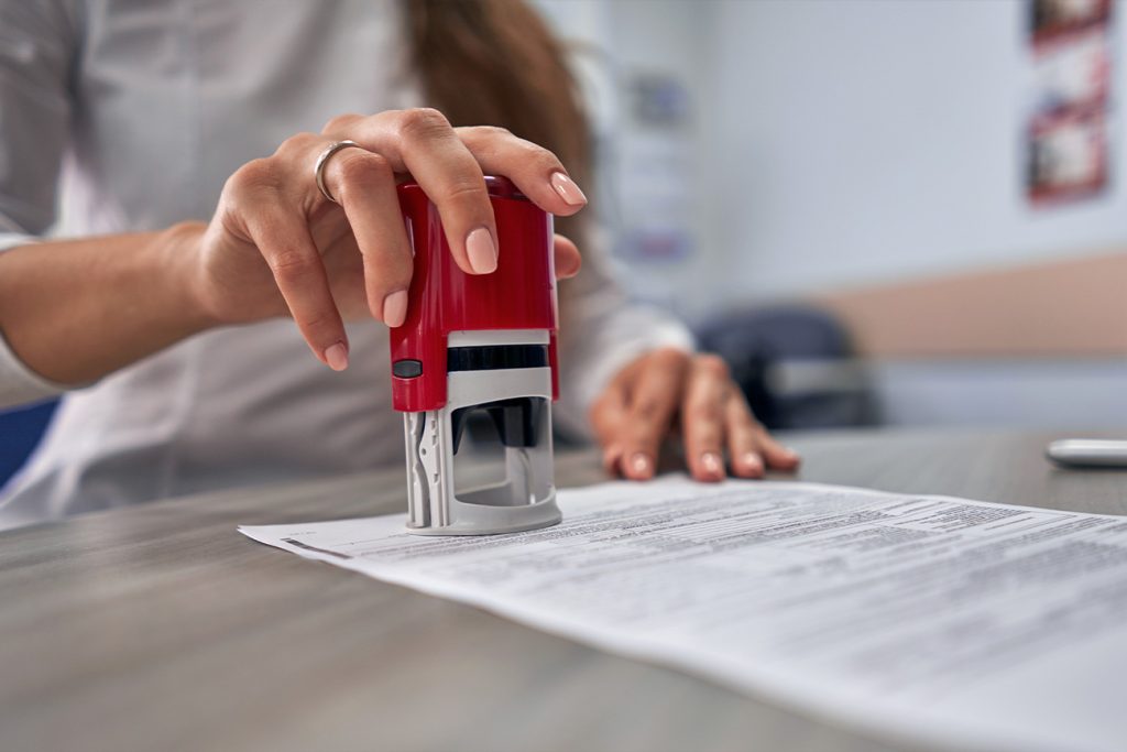 Notary public working at her desk