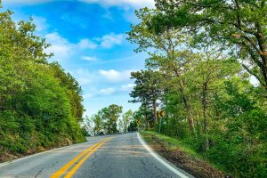 Notary driving down an Arkansas road