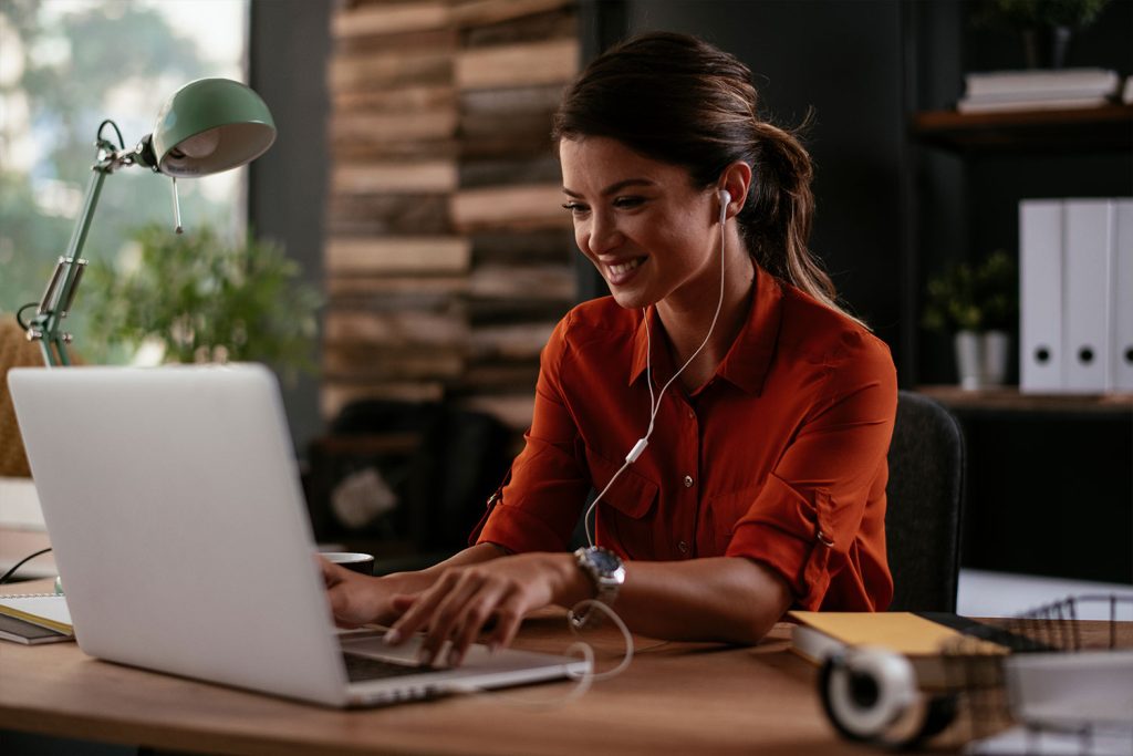 Women working on computer with notary client in Michigan