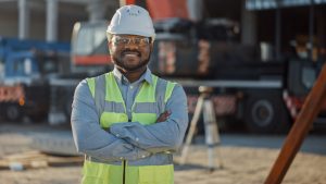 Bonded contractor standing at worksite